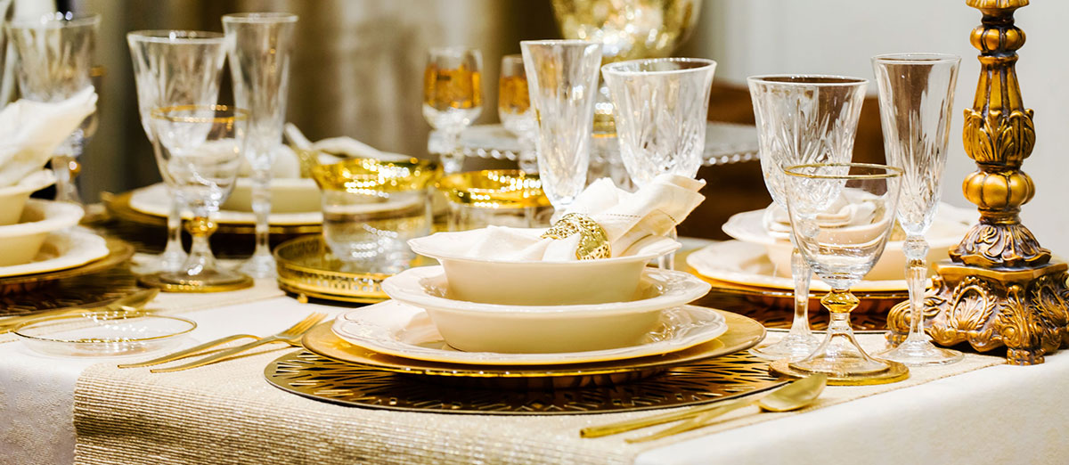 Place settings of a dinner table during the holiday season